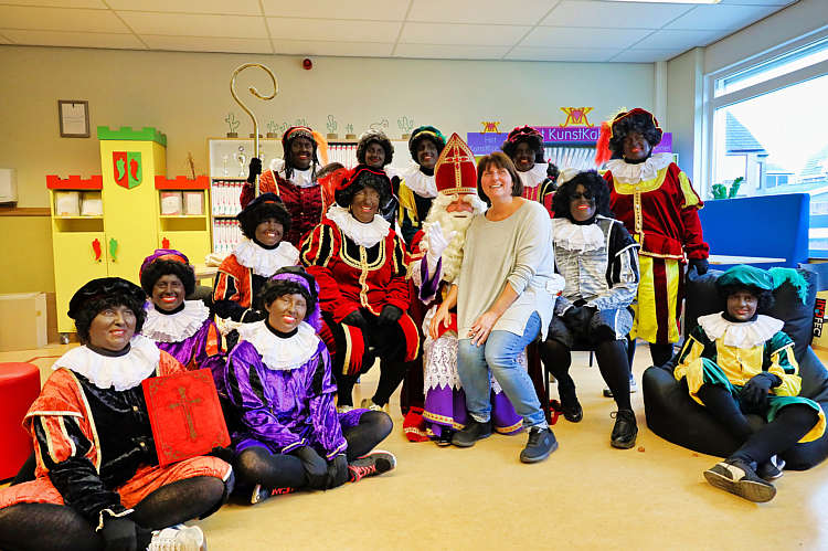 Aankomst van de Sint en zijn Zwarte Pieten in Waarder_139